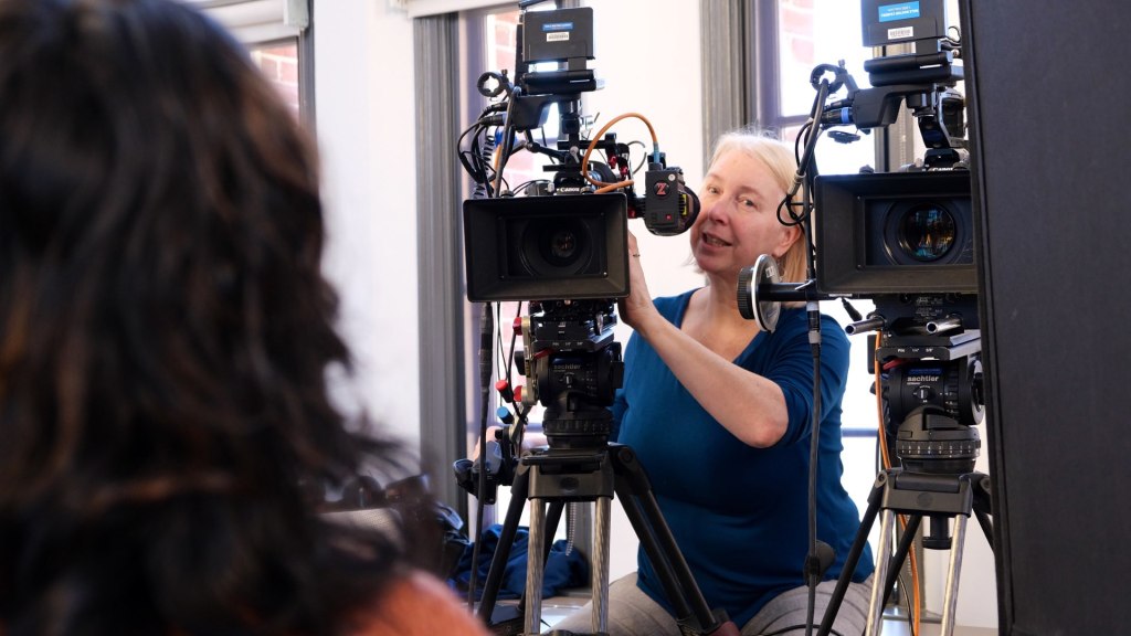 DP Claudia Raschke setting up a multi-camera interview. Photo courtesy of Storyville Films